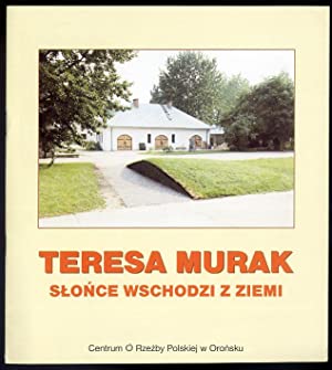 Grafika produktu: Teresa Murak. Słońce wschodzi z ziemi.