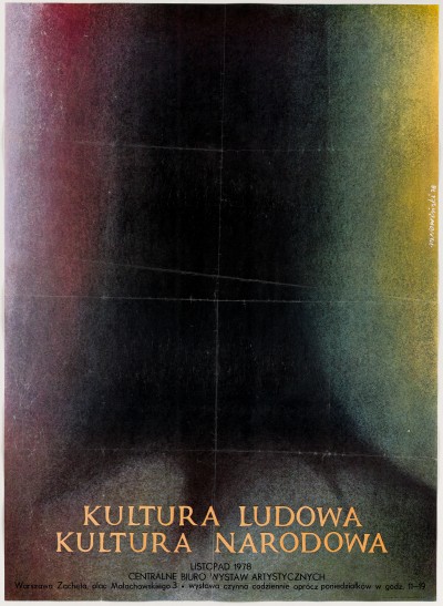 Całość zajmuje reprodukcja grafiki: większość zajmuje czarna plama, po bokach tylko nieco rozświetlona niewyraźnymi kolorami.